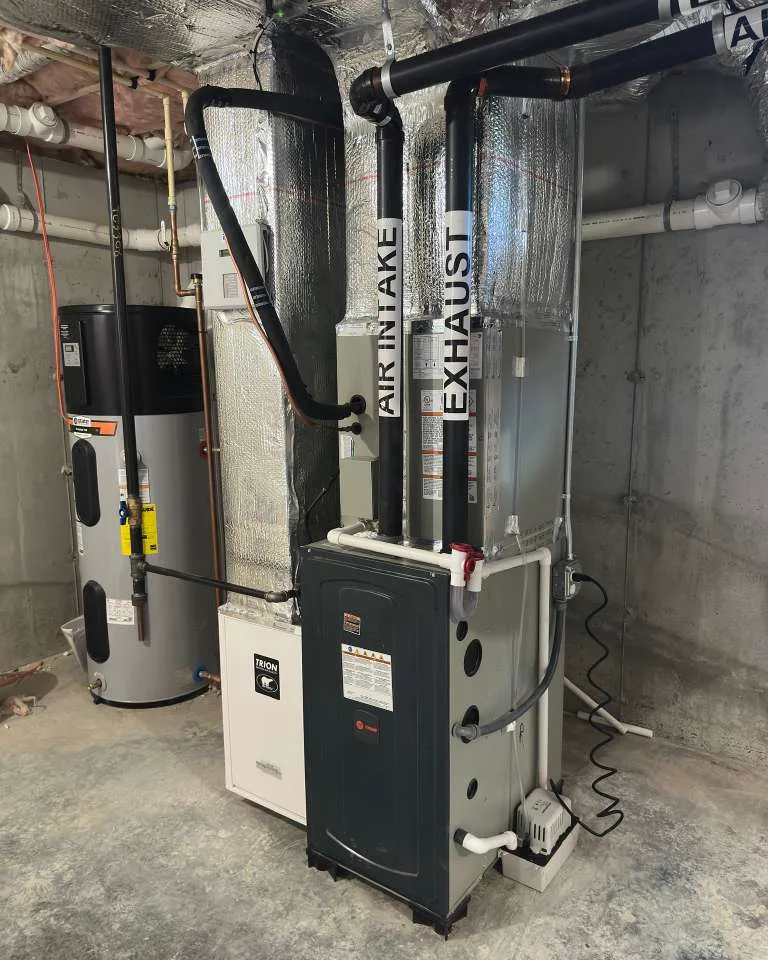 Furnace with insulated intake and exhaust runs installed by AirPrime
