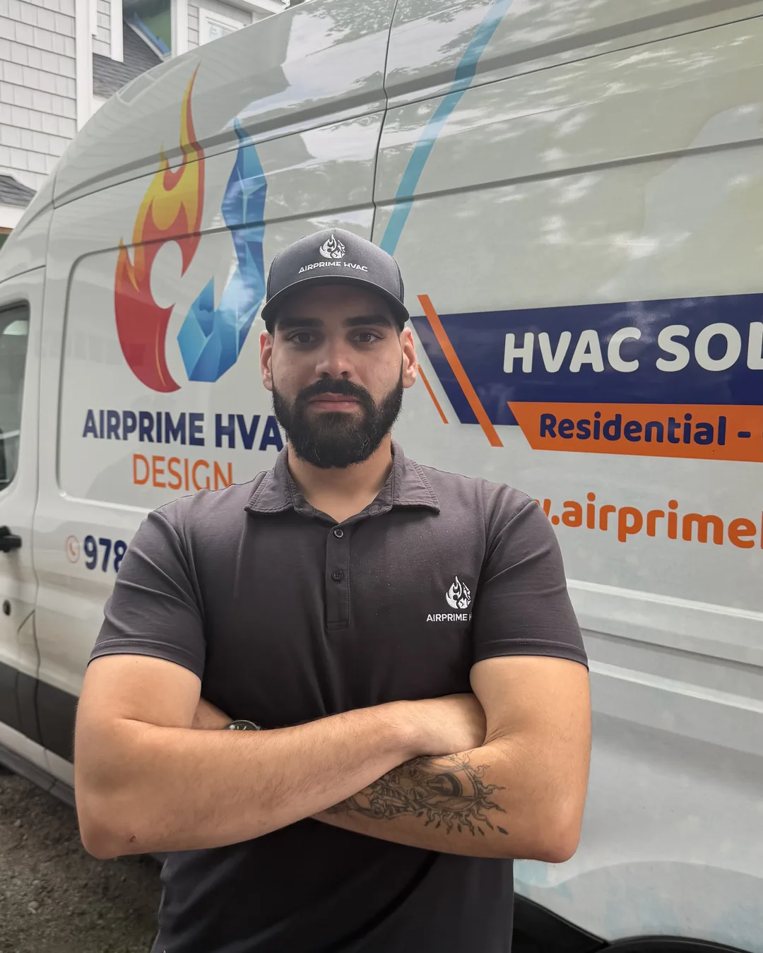 AirPrime team member on site in front of a branded service van